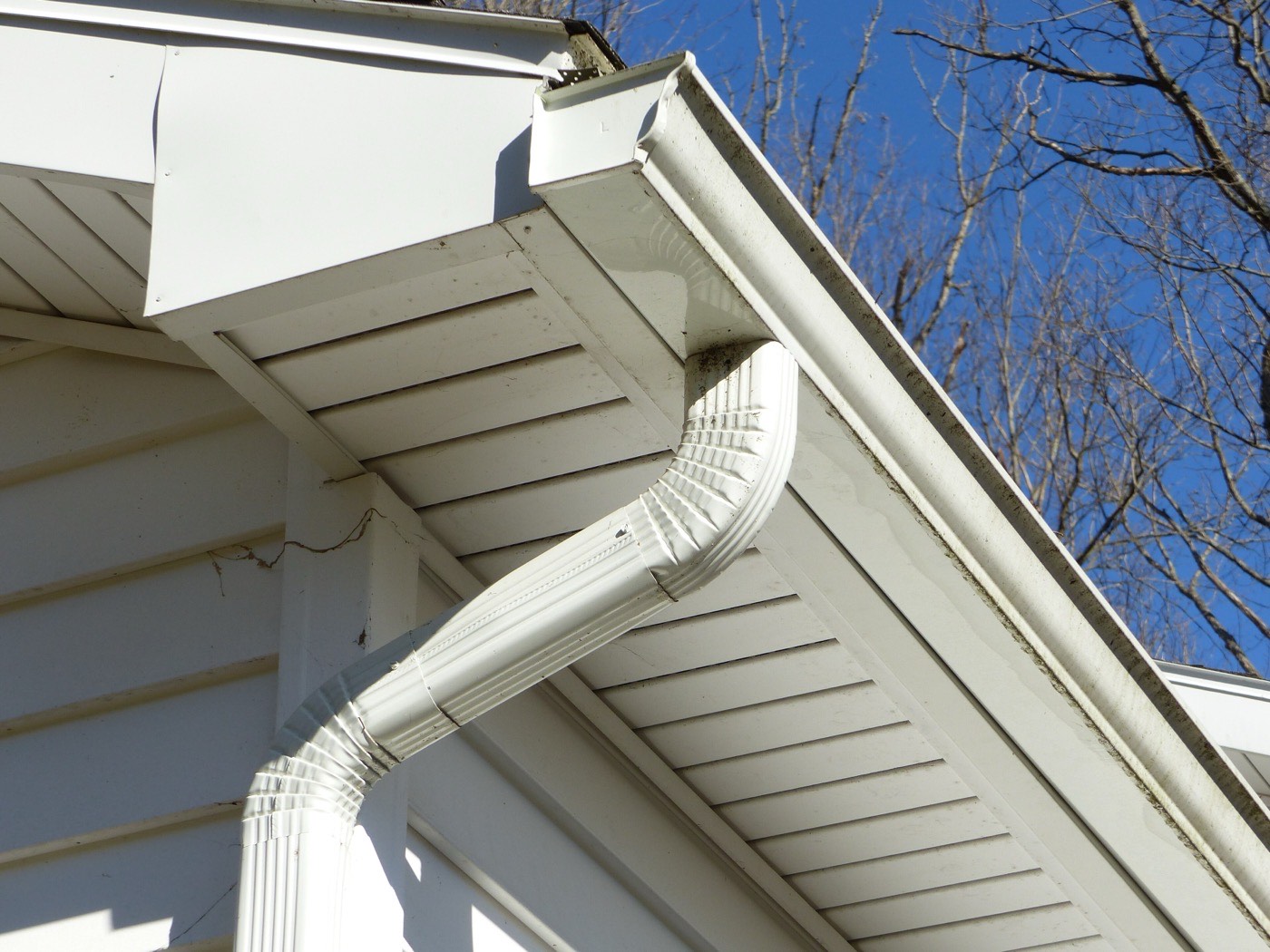 Seamless aluminum gutter with its outlet, elbows and downspout